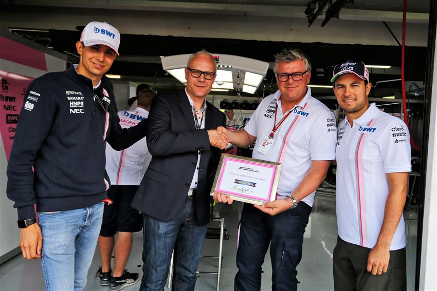 RAVENOL Motorsport Director Martin Huning accepts the official Force India Technical Partnership certificate from Otmar Szafnauer, Esteban Ocon and Sergio Perez